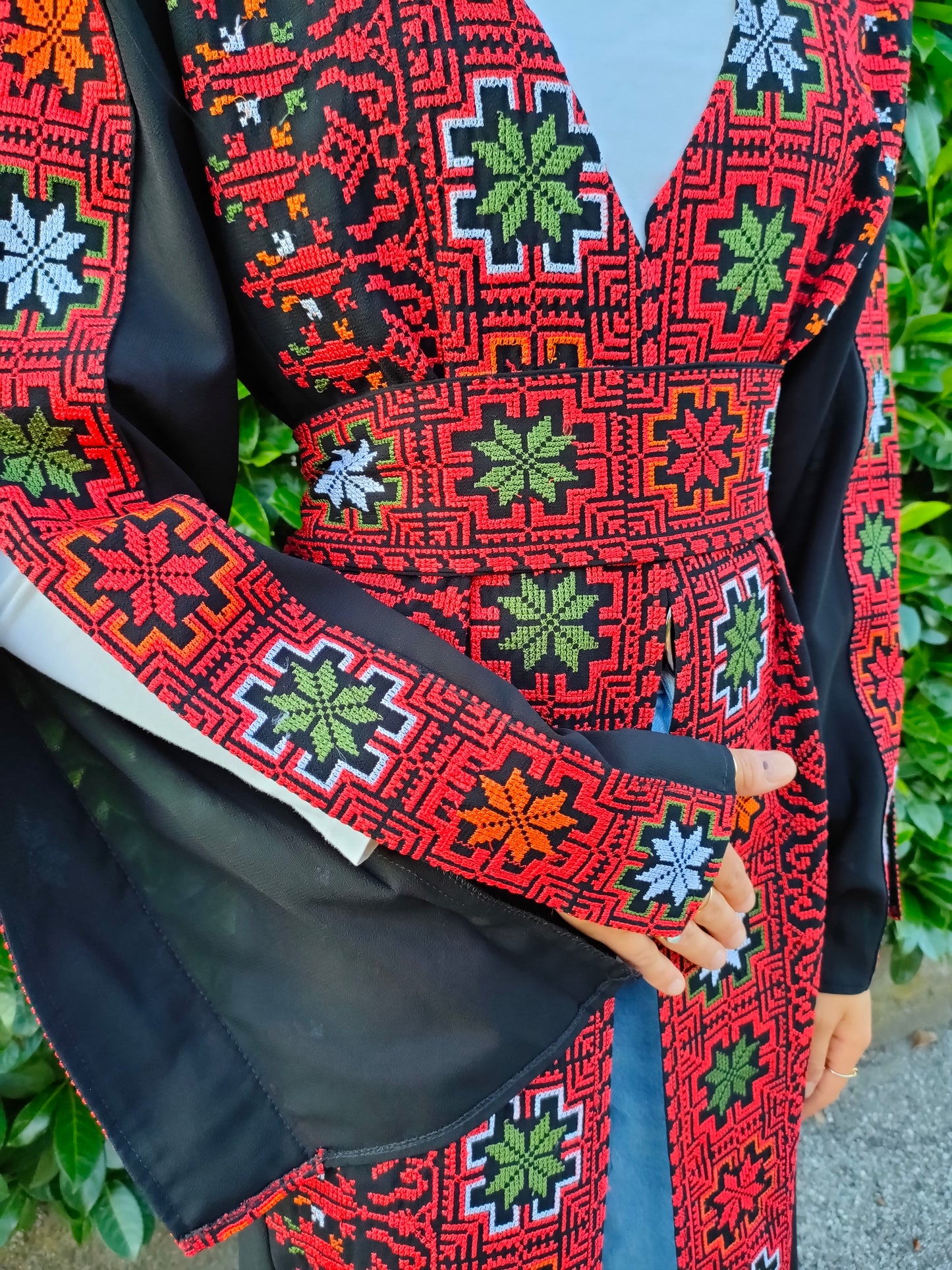 Long vest with open sleeves