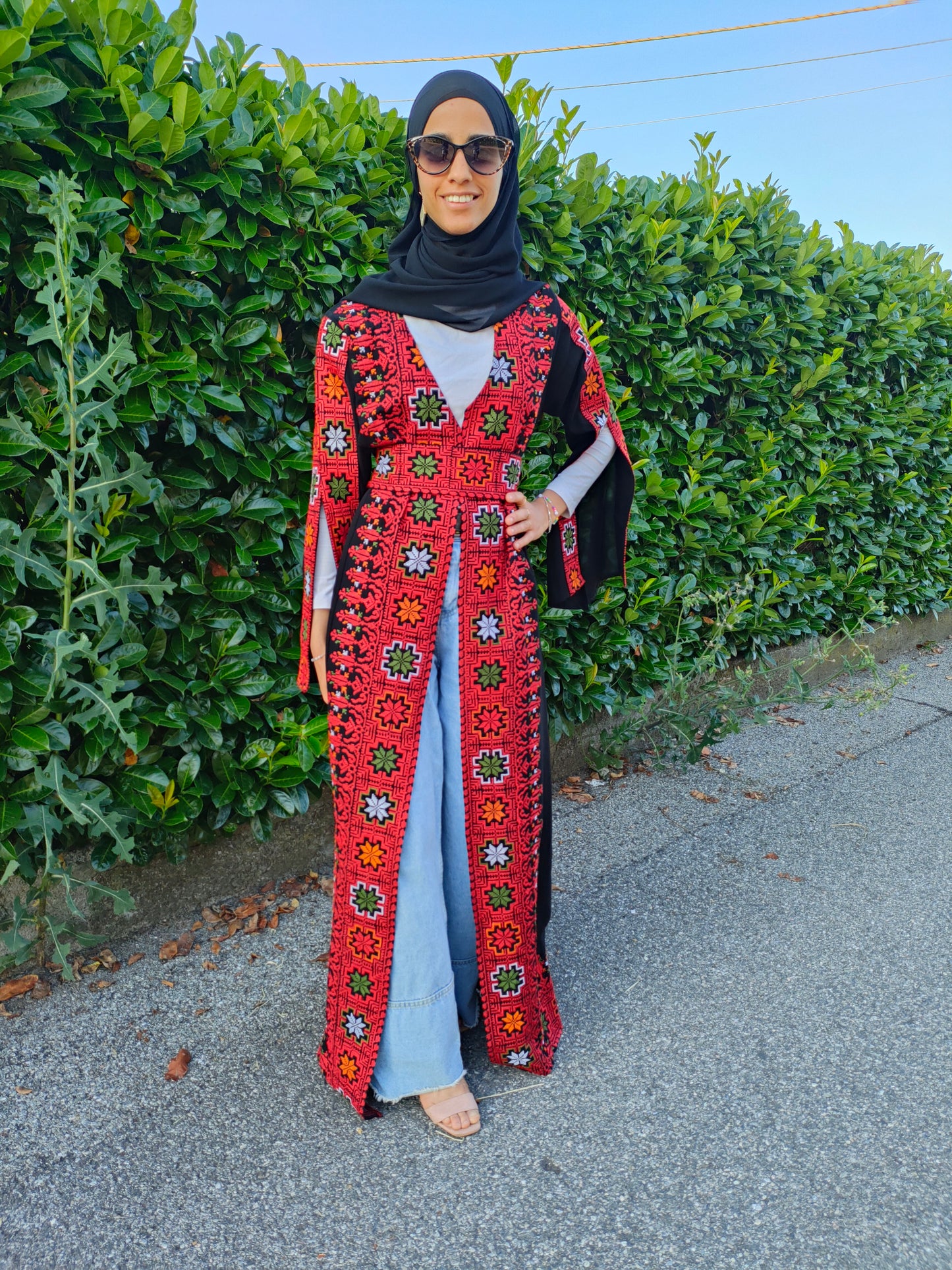 Long vest with open sleeves